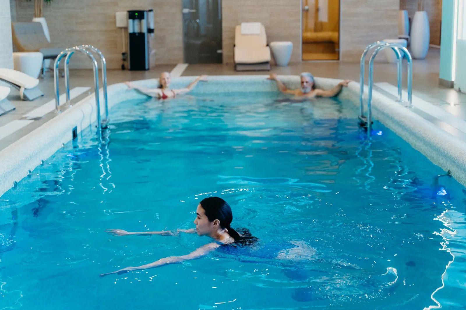 swim spa vs pool comparison of a compact backyard swim spa