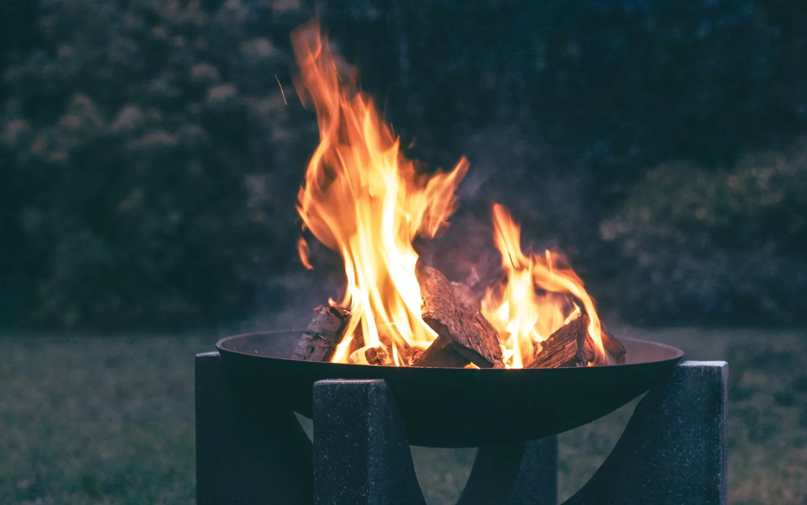 Built-in stone fire pit with professional installation