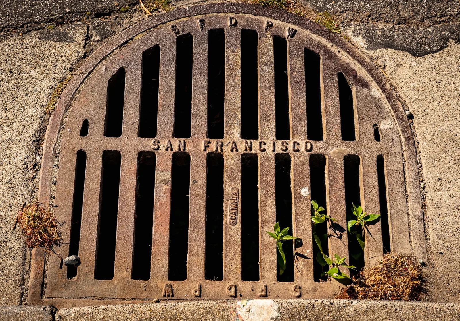 installed french drain trench with gravel and pipe