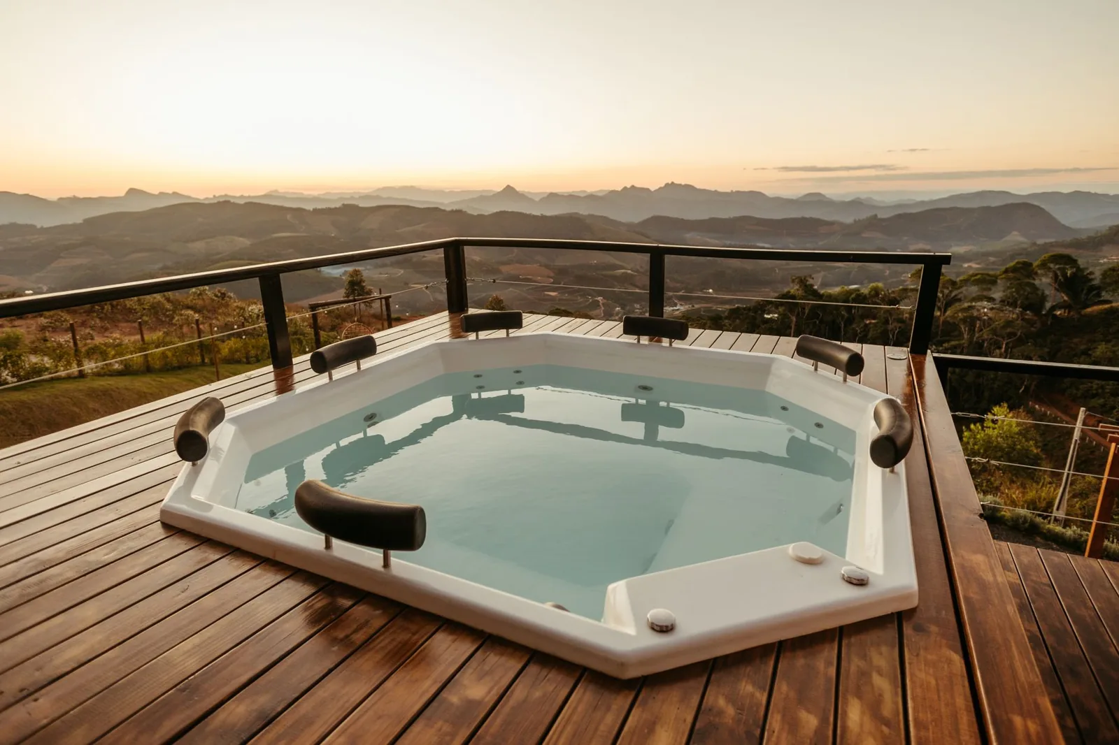 backyard hot tub installed on a concrete pad