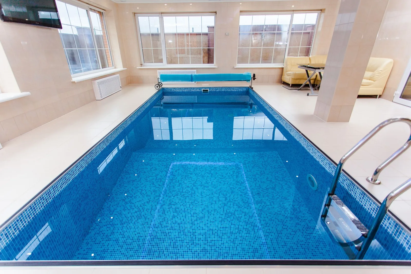 installing a mesh safety cover on an inground pool